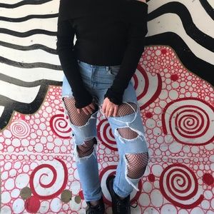 Ripped fishnet jeans